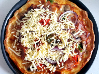 29、~创意披萨☺,再撒上余下的芝士。