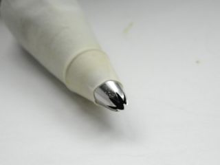 11、抹茶曲奇,烤盘垫一层油纸，裱花袋整形下