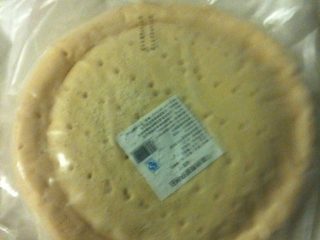 1、美味牛肉披萨,拿出，解冻比萨饼