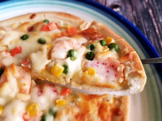 14、椰风咖喱披萨,边上很脆，芝士和咖喱的结合夹杂着椰子的香味。