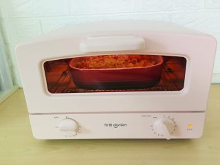 8、馒头版披萨,烤至芝士碎融化。