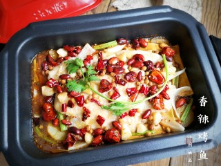 22、家庭版自制烤鱼,香辣过瘾,外酥里嫩,一道美味的香辣烤鱼就做好了。一边煮一边美美的享用吧。以后不用烤箱,在家也能做烤鱼吃了。