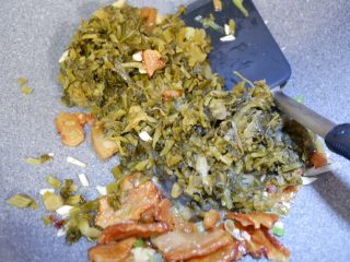 29、完美便当方程式「11」,然后加入雪菜翻炒均匀。