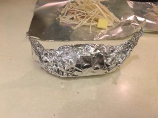 19、宝船蒸,左右两端捏紧，稍稍调整个角度即可。再次提醒！要封好！