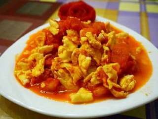 5、番茄炒蛋,最后一步准备一个碗把做好的番茄炒蛋陈放入碗中即可。