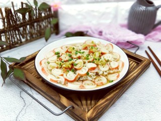 13、新年必备的双味儿蟹肉蒸金针菇,蒸好的蟹肉棒金针菇，撒上葱花。